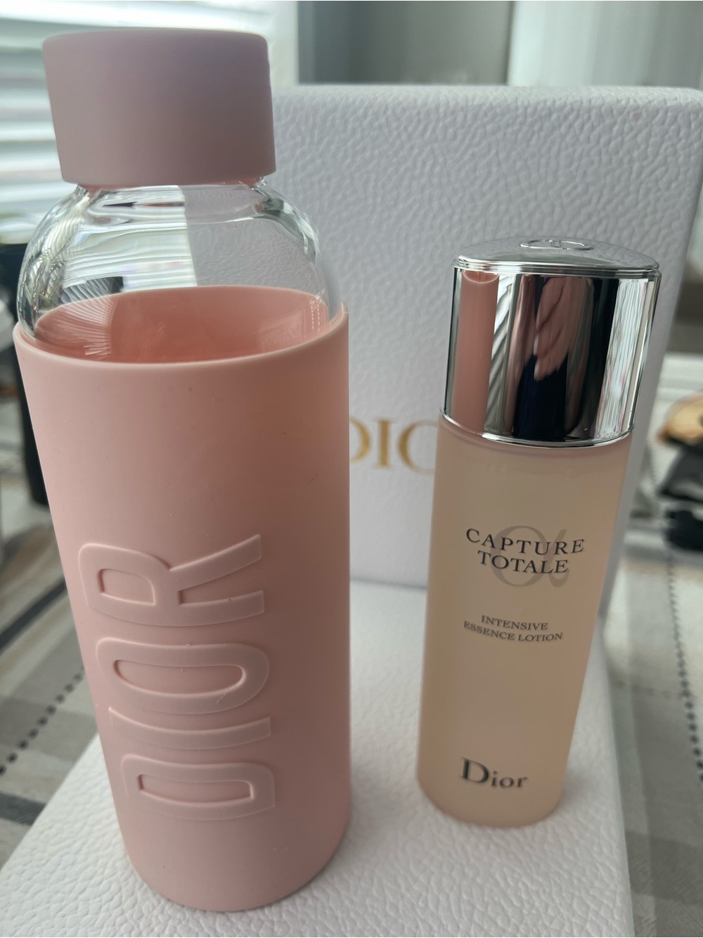 Dior Glass Bottle w\silicone sleeve & Capture Totale Intensive Essence Lotion